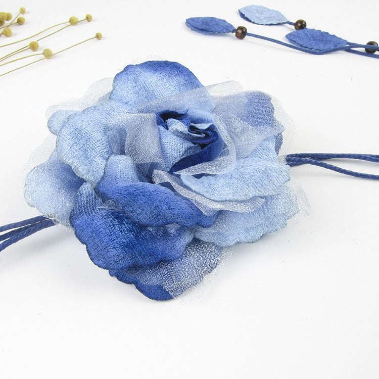 Blue fabric flower applique with long belt cord and hanging leaf tassels