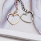 Heart pendant waist chain with gold- and silver-tone linked heart charms and chain