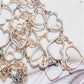 Mixed-tone metal heart-link waist chain with small dangling heart charms