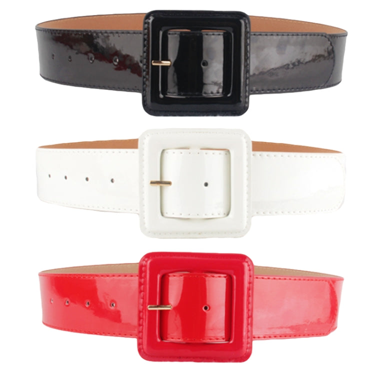 Set of glossy wide belts with square buckles in black, white, and red