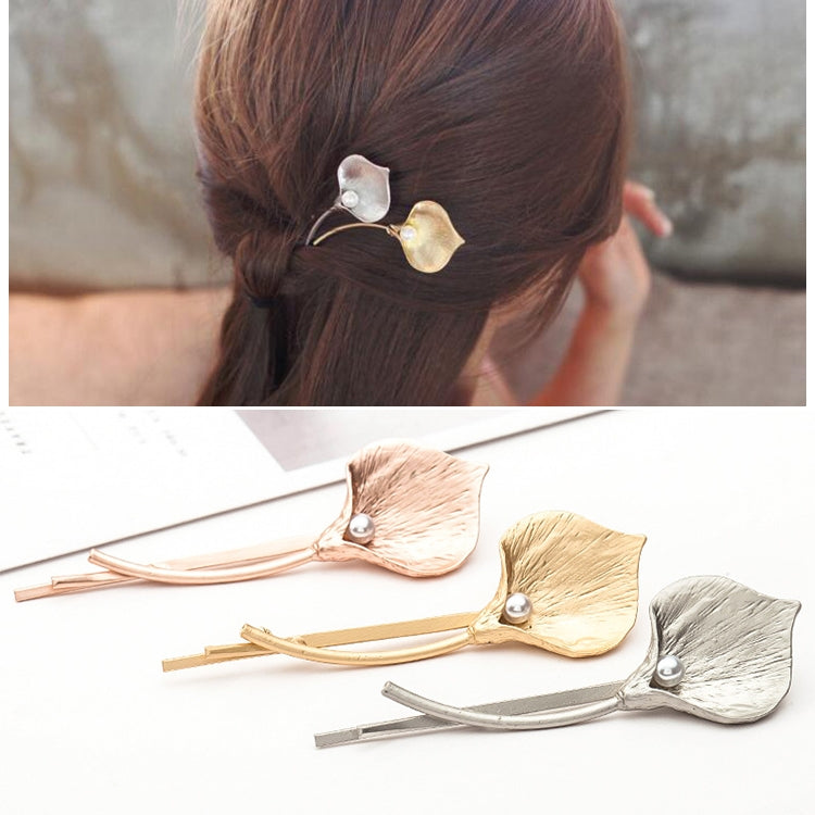 Gold and silver leaf hair barrettes with pearl beads, two metal pins
