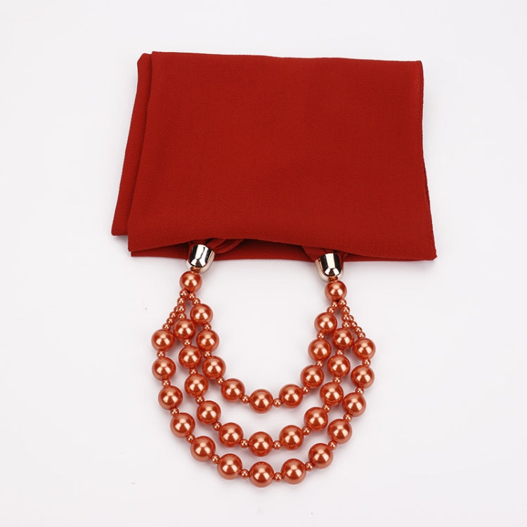 Red scarf with copper-gold imitation pearl necklace, layered round bead strands
