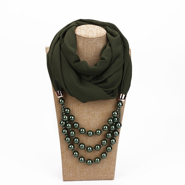 Army green scarf with dark green imitation pearl necklace, layered round beads