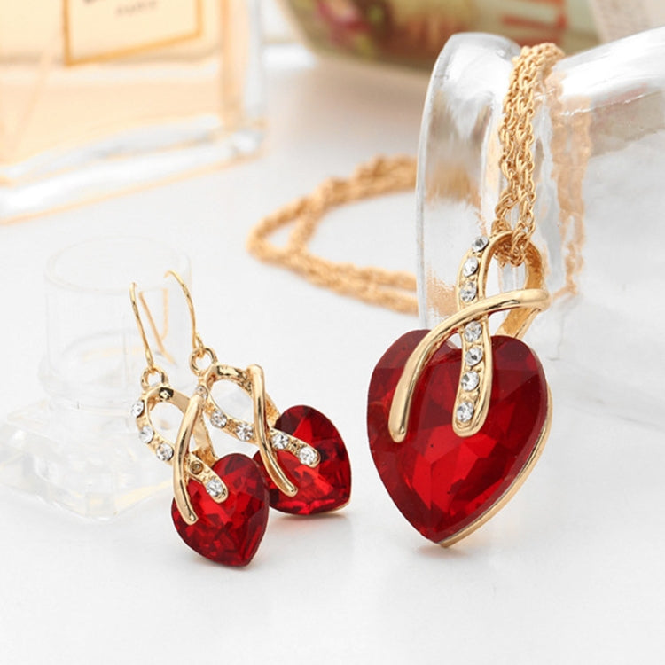 Gold-tone heart jewelry set with red heart pendant necklace and red heart drop earrings