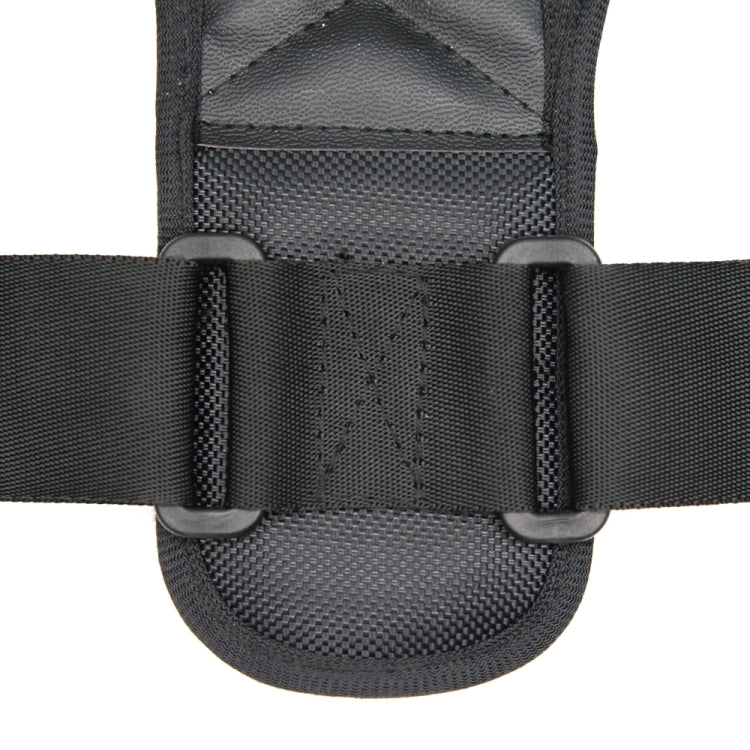 Adjustable black strap and buckle on posture corrector back brace, padded interior
