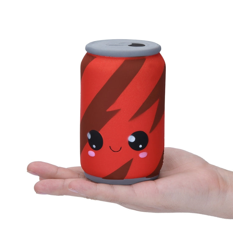 Small red squishy can toy with gray lid, cute face on front