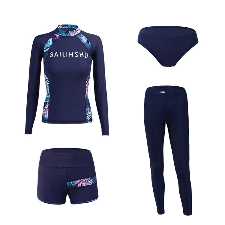 Navy long-sleeve rash guard with matching shorts and bikini brief, tropical print accents