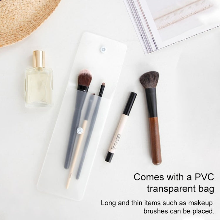 Transparent PVC pouch included with makeup brushes and tools
