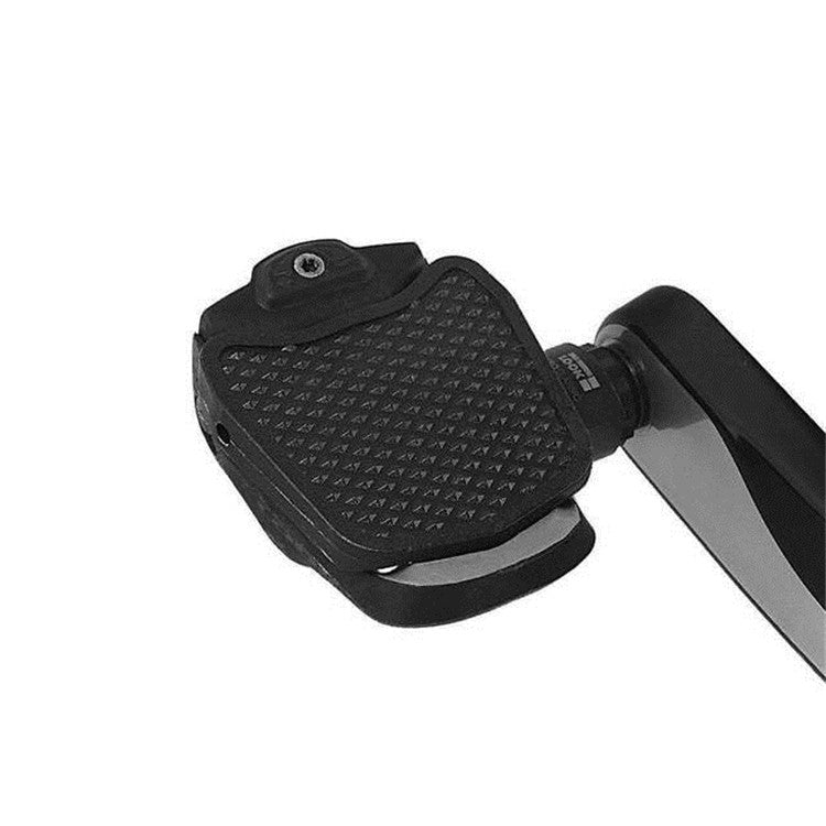 Bike pedal lock to flat converter attached to a bike pedal, black textured pad