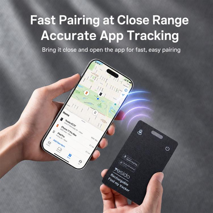 Anti-loss card tracker held in hands with smartphone app tracking screen