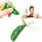 Green extrusion pea keychain pods with small face charm and metal chain