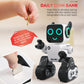 White toy robot with glowing blue eyes inserting a coin into a slot.