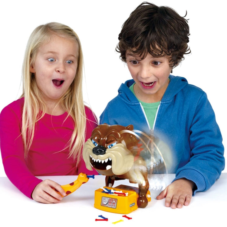 Toy dog hand-biting game with orange base and bite-trigger pieces