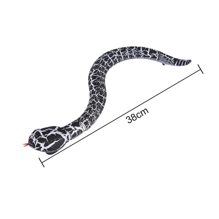 Black-and-white patterned infrared remote-control snake toy with long stretched body