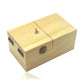 Light wood anti-stress box toy with two hinged top panels and metal latch knob.