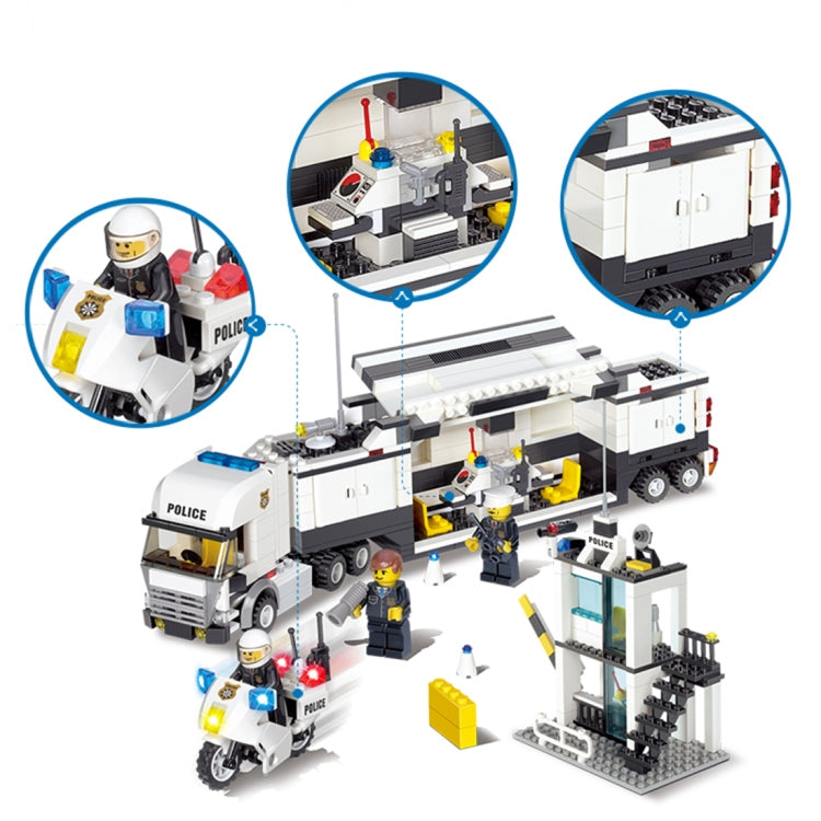 Police station building set with police truck and tower, shown with officer minifigures.