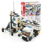 Police station building set with police truck, tower, minifigures, and retail box.