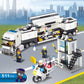Police station building set with police truck, officers, and control tower built from blocks.