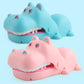 Cartoon hippo bite hand toy set in blue and pink, open jaws with white teeth