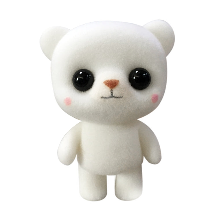 White plush bear doll with glossy black eyes, pink cheeks, and fuzzy muzzle