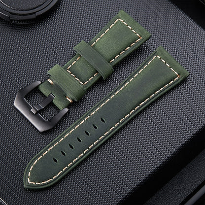 Army green leather watch band with stitched edges and metal buckle, pin holes