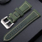 Army green leather watch band featuring silver-tone buckle and perforated strap holes