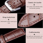 Brown leather watch strap with classic pin buckle and visible buttonholes