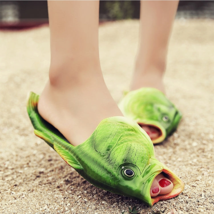 Close-up of green fish-shaped EVA kids’ beach sandals, open toe and fin detail