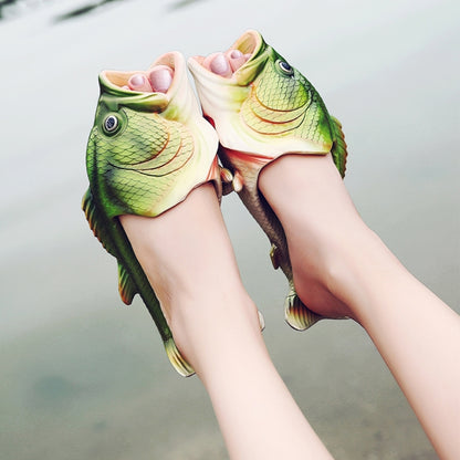 Fish-shaped EVA slip-on sandals with green scale pattern and open toe, worn by feet