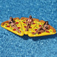 Inflatable pizza slice pool float with yellow topping graphics and orange border, four swimmers