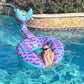 Inflatable mermaid tail pool lounge ring with purple-pink scales and teal tail tip