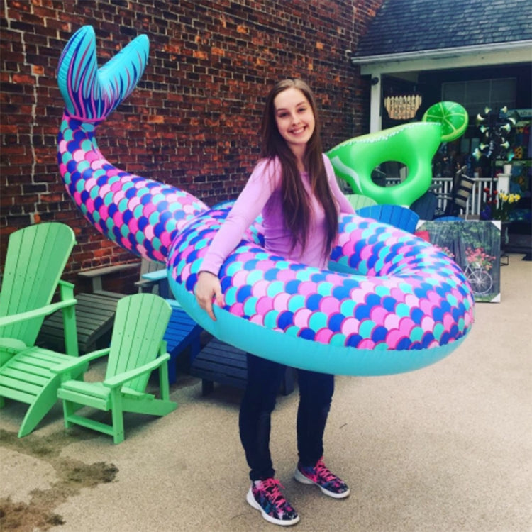 Inflatable mermaid tail lounge with colorful purple-pink scale pattern and teal edging