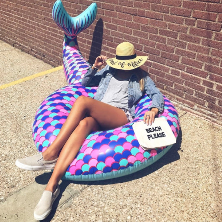 Inflatable mermaid tail lounge with purple-pink scales and teal fin, open inner ring