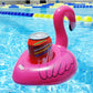 Inflatable pink flamingo shaped floating drink holder holding a can