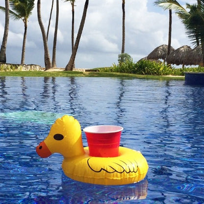 Inflatable yellow duck-shaped drink holder with red cup