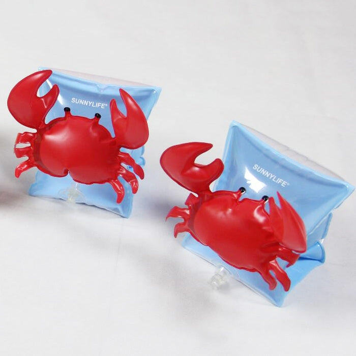 Pair of red crab-shaped inflatable arm bands with light blue float sleeves