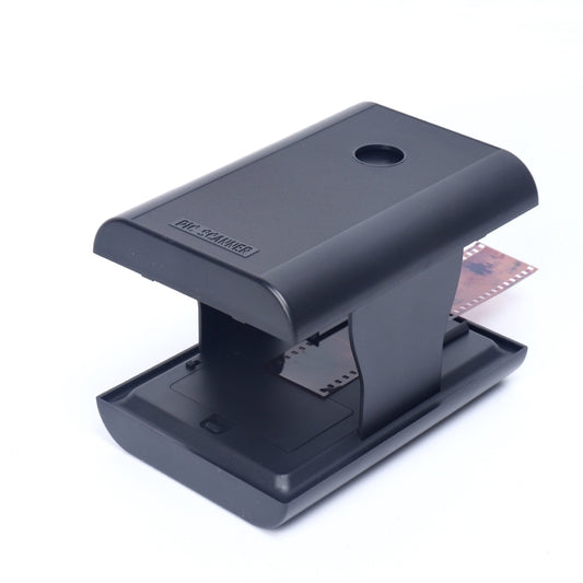 Dark gray film scanner cradle with a 35mm negative strip inserted