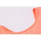 Coral yoga top neckline close-up with contrast edge stitching