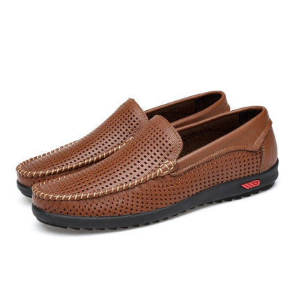 Brown perforated leather slip-on loafers with round toe, metal bit, and black rubber sole.