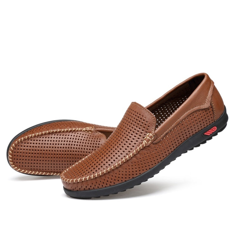 Brown perforated leather loafer with round toe, metal bit, and black outsole; slip-on style.