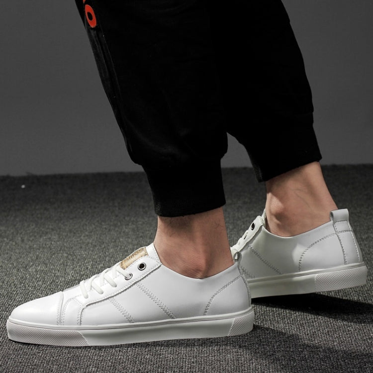 Men's white lace-up casual sneakers with side stitching and textured rubber sole