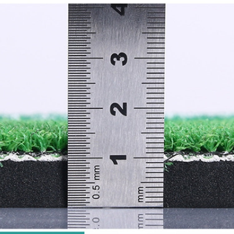 Golf mat thickness measurement shown with a metal ruler across the edge