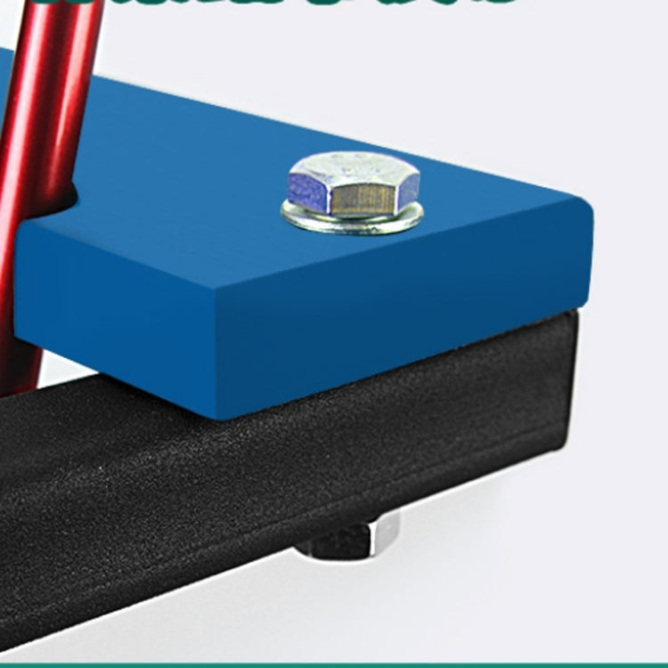 Close-up of golf rack base corner with blue cover and black textured mat