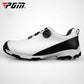 Men's white and black golf shoes with rotary buckle strap and rugged traction sole