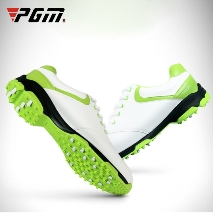 White golf sneakers with neon green accents and textured traction cleat outsoles