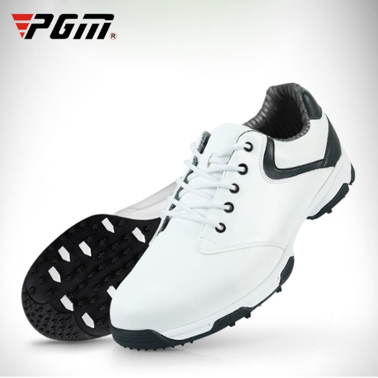 White lace-up golf sneaker with black outsole and dark heel collar