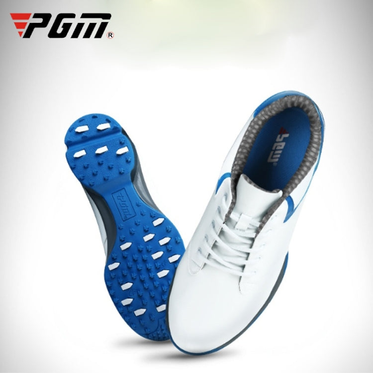 Men's blue traction golf sneakers with white upper and studded sole
