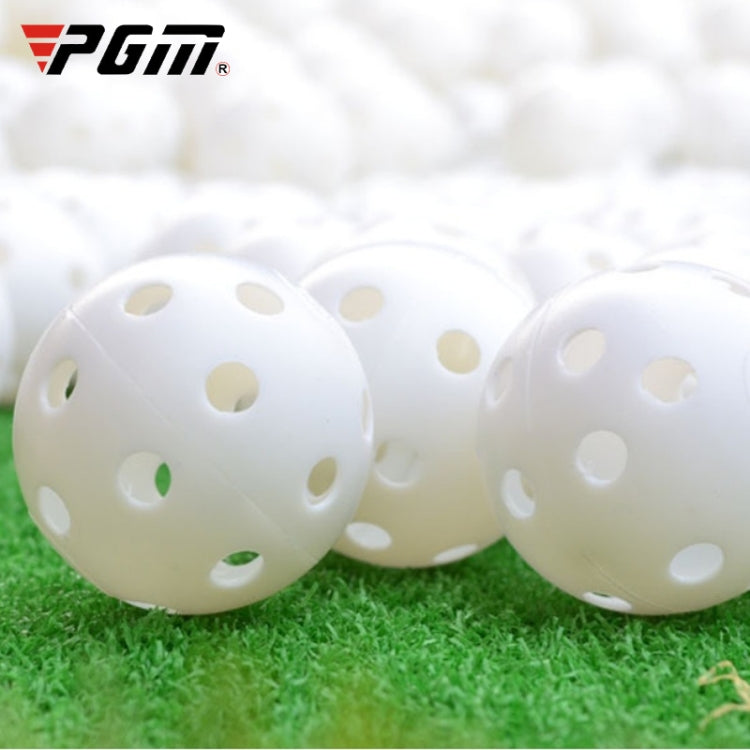 White hollow golf exercise balls, perforated plastic with oval holes