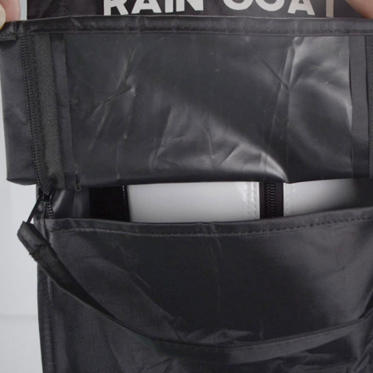 Black golf bag rain cover with zipper seam and fabric flap detail, close-up