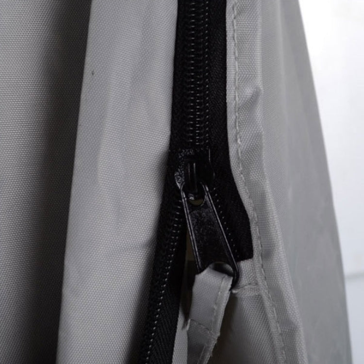 Grey golf bag rain cover zipper and stitched fabric edge, close-up
